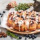 depositphotos 109792744 stock photo cinnamon buns with lemon blueberry 80x80 - Rollos de canela con limón y arándanos